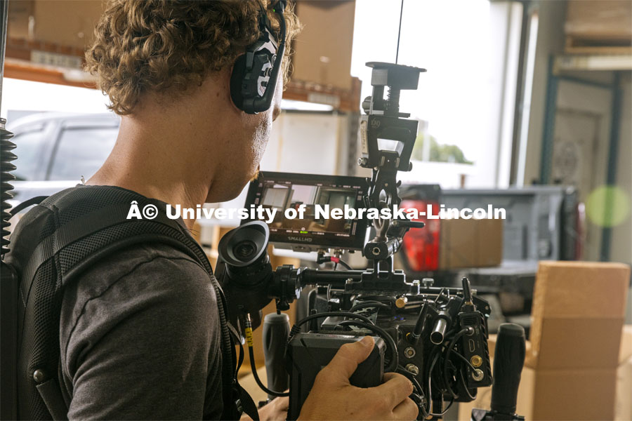 Videoing Oak Barn Beef in Westpoint, Nebraska. Behind the scenes photo for the university's new "Home Again" national advertisement. June 27, 2024. Photo by Kristen Labadie / University Communication.   